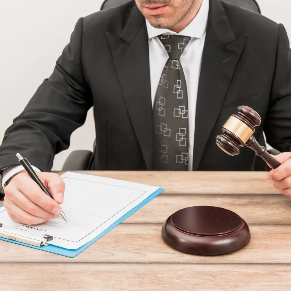 A gavel and tax document on a judge’s desk, representing a property tax appeal case